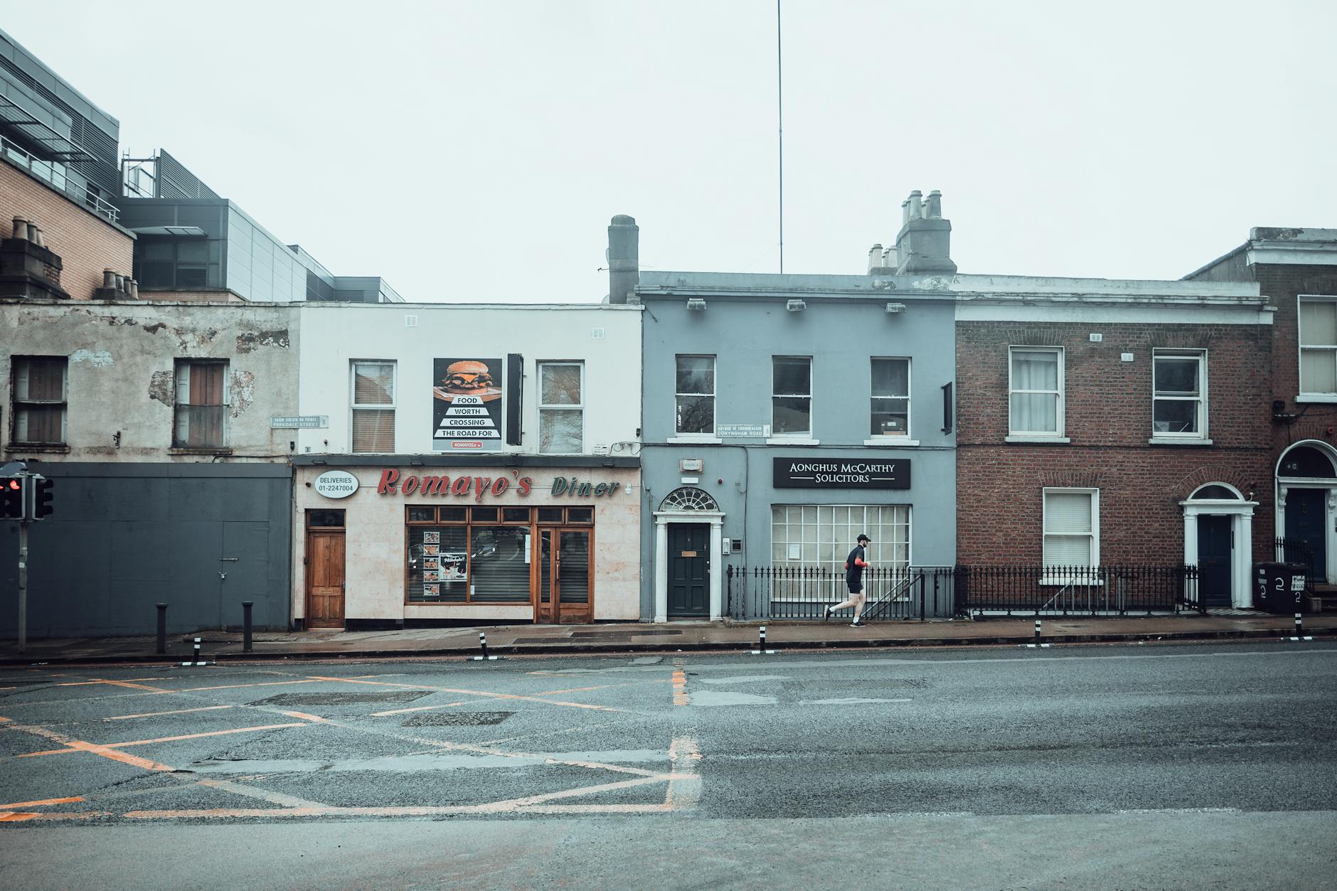 Couple walking through Dublin Georgian streets