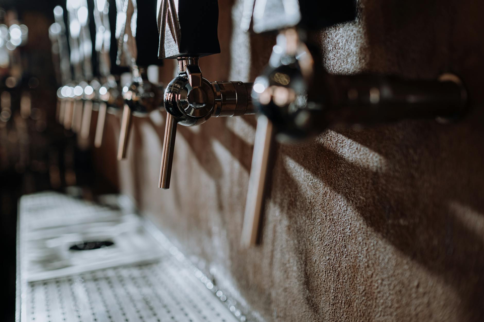 Craft beer taps at a Dublin brewery taproom