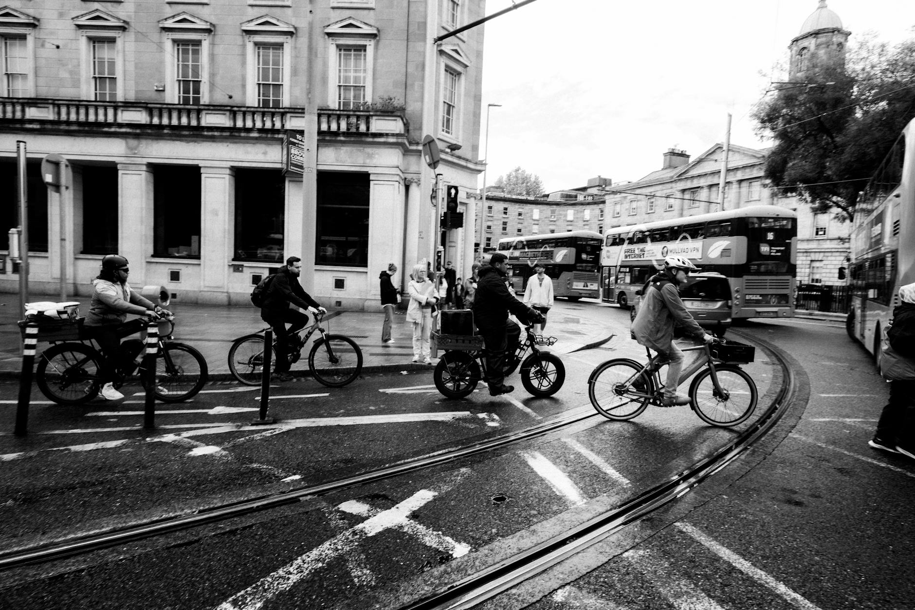 Cyclist riding through Dublin city streets