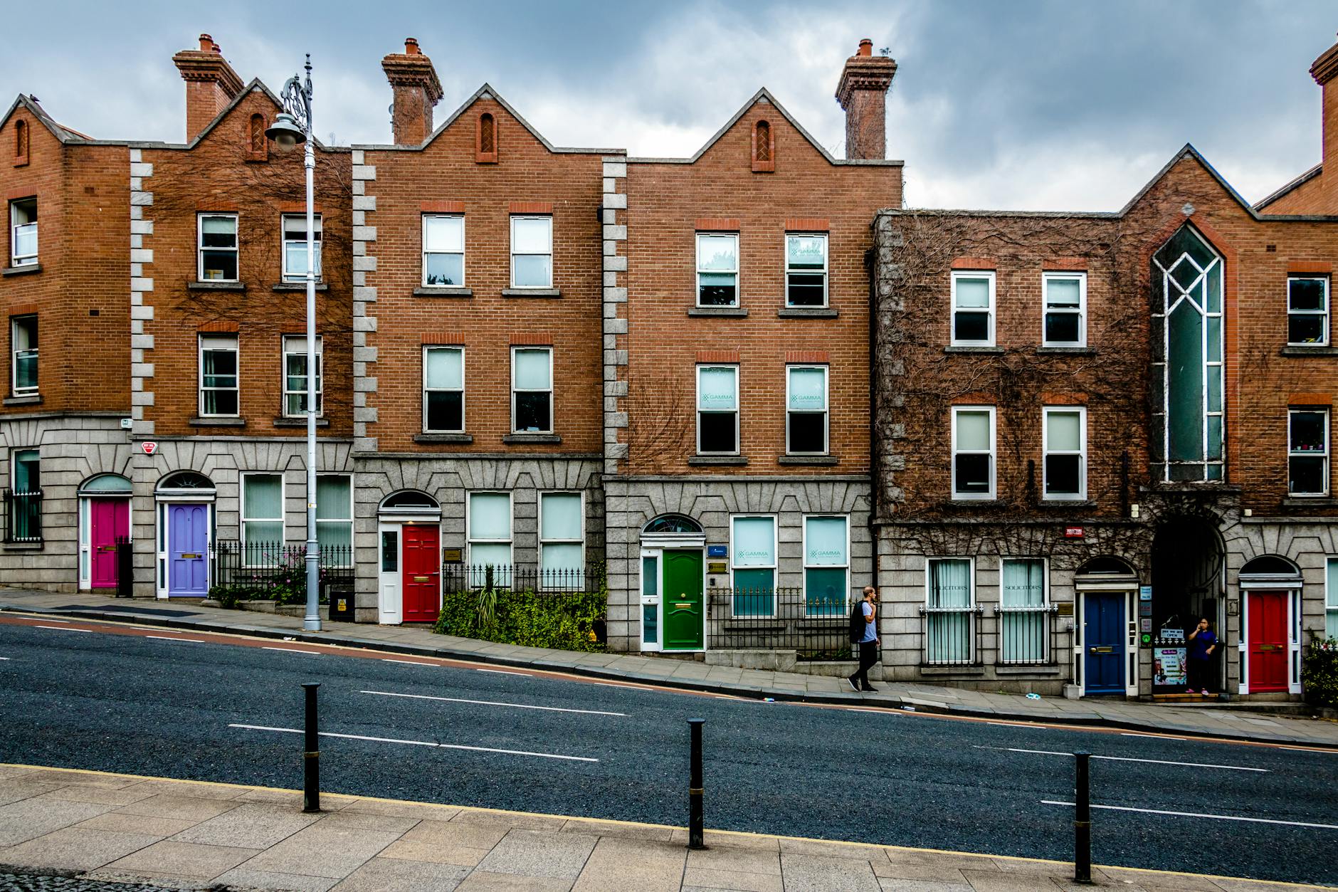 Colorful Dublin street lined with restaurants and Georgian architecture
