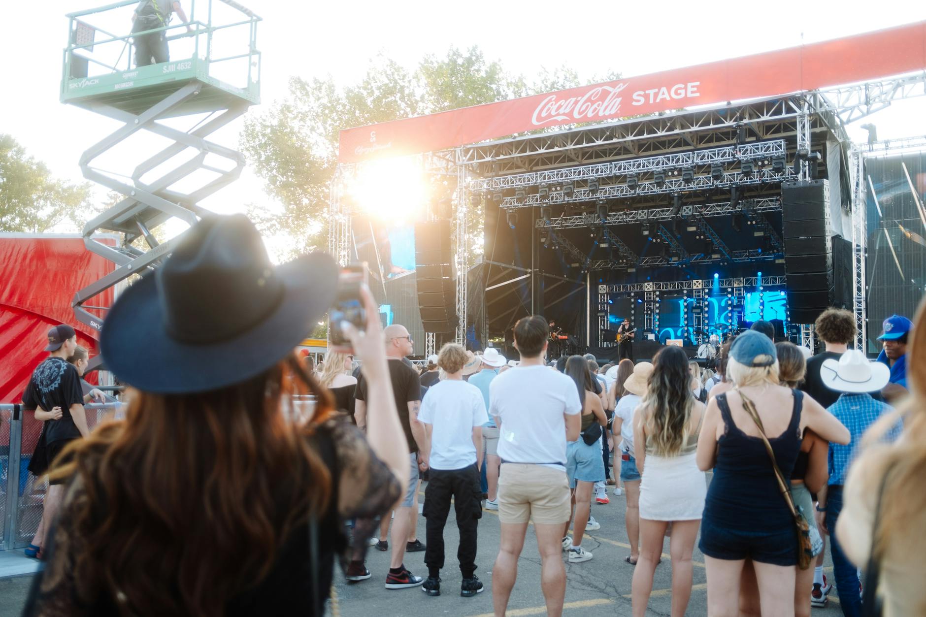 Outdoor music festival crowd enjoying a summer concert