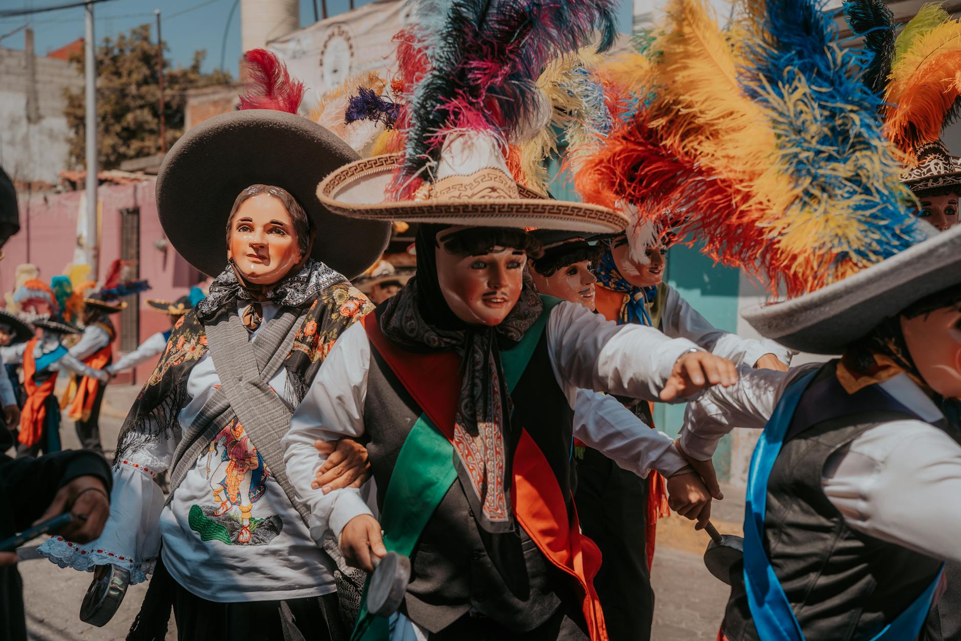 Colourful street parade with performers and celebrations