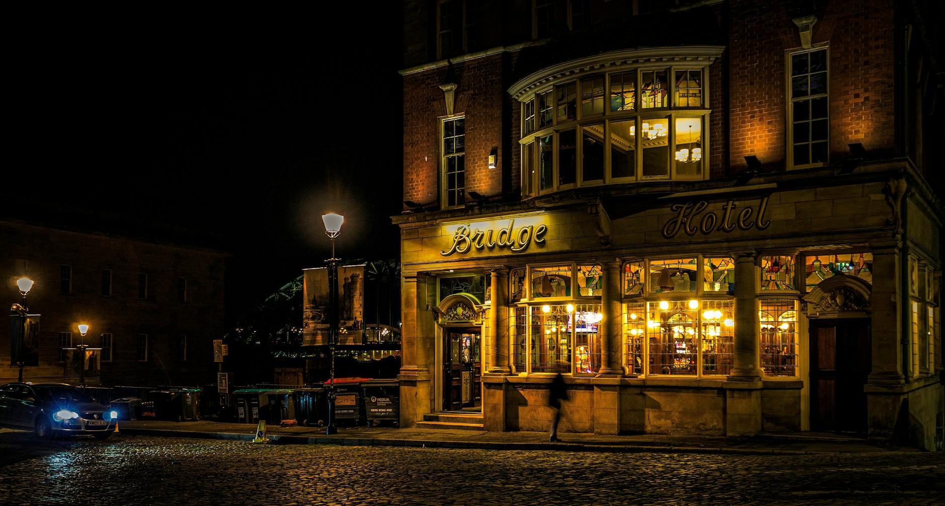 Dublin pub street at night with warm lights
