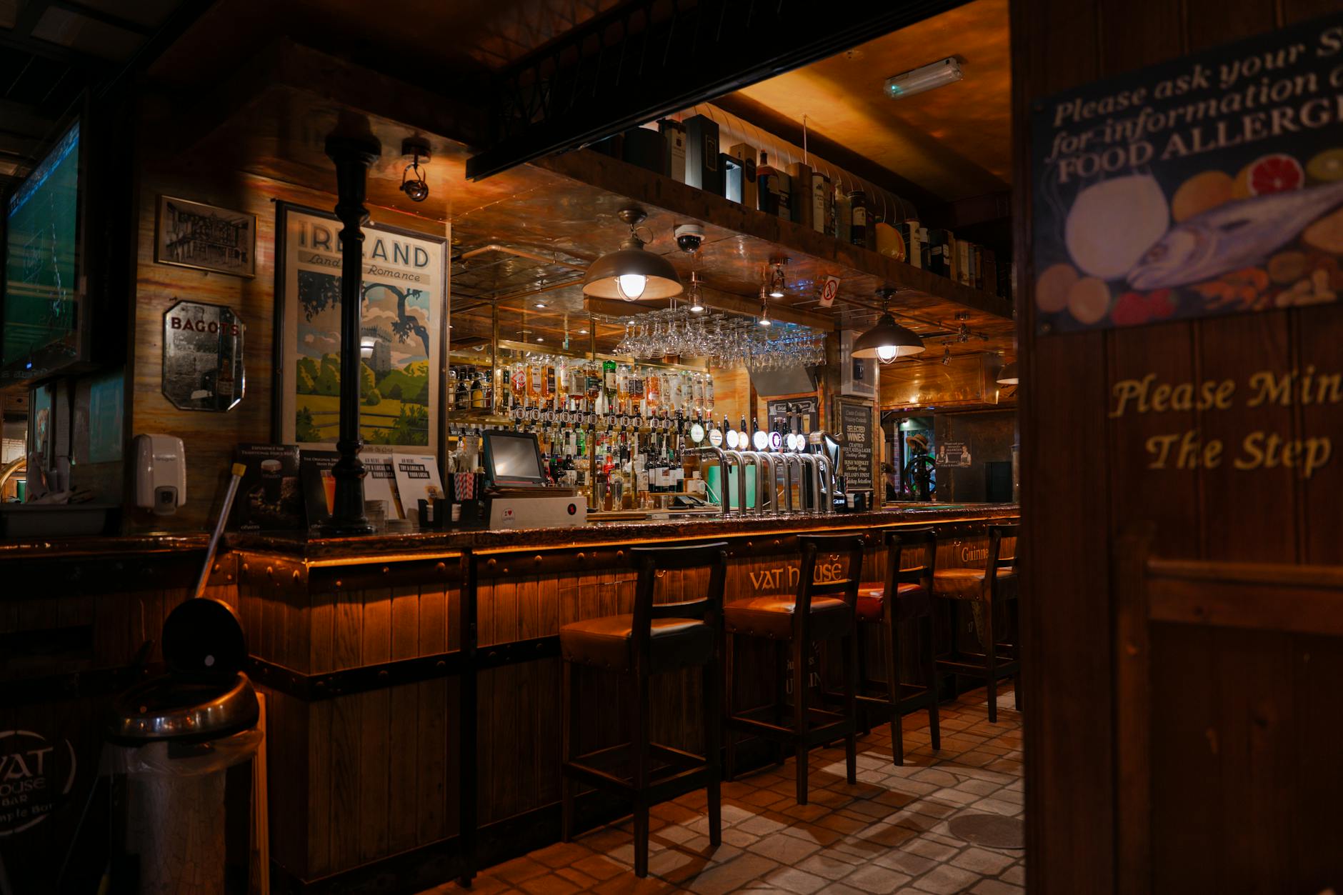 Traditional Irish pub interior in Dublin with wooden bar
