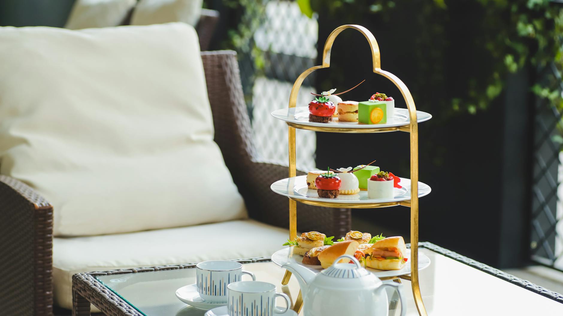 Warm scones with cream and preserves on a five-star Dublin afternoon tea stand