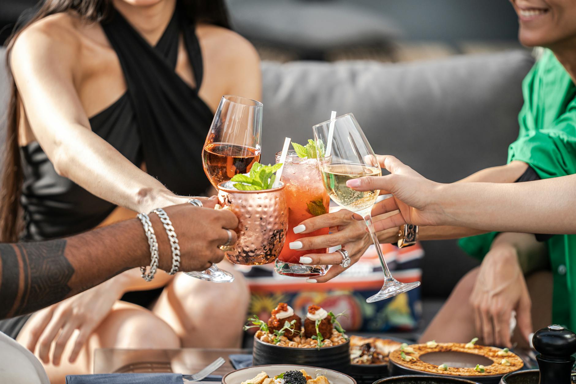 Rooftop cocktail bars combine drinks with skyline views