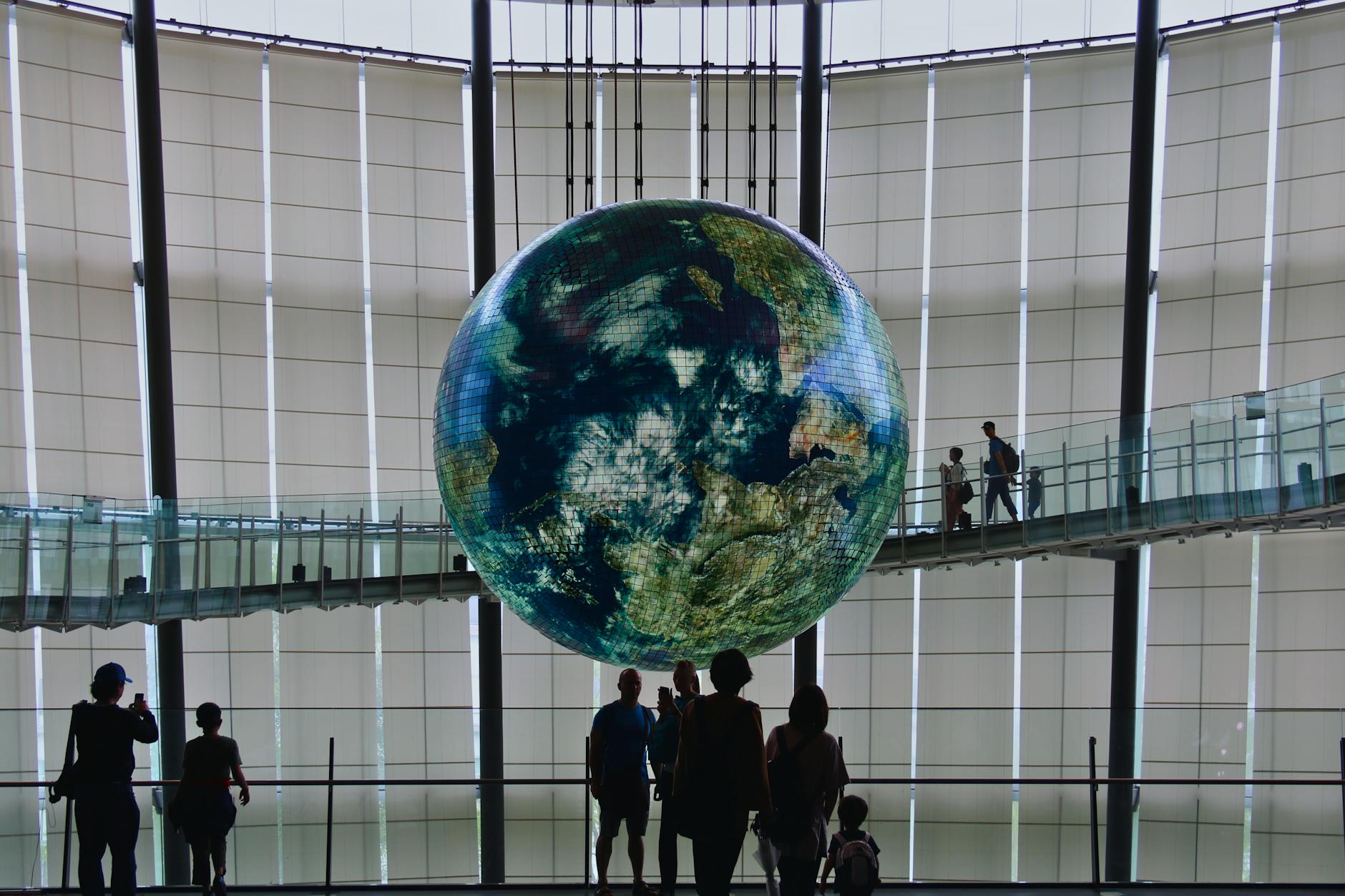 Luke Jerram's Gaia sculpture currently hangs in the Long Room