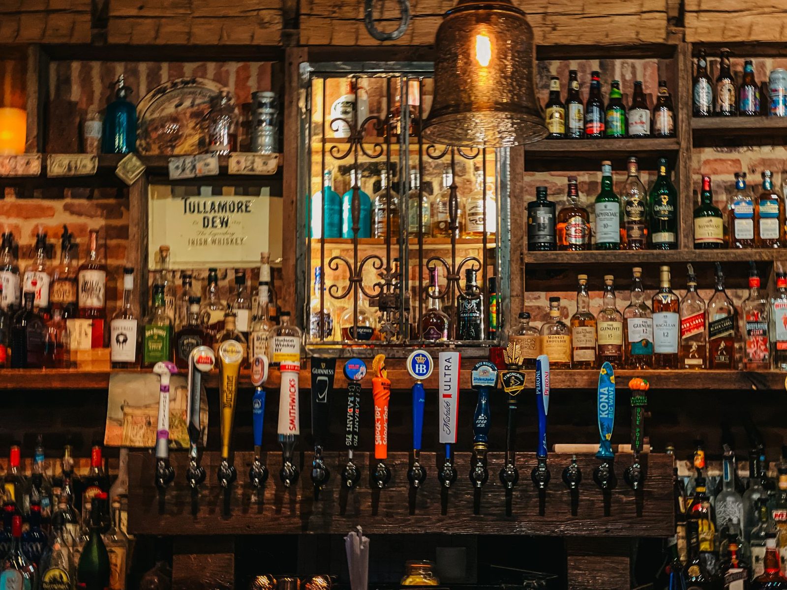 Cosy traditional Dublin pub interior with a warm fire on a November evening