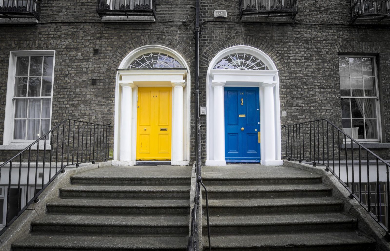 Colourful Georgian doors on a Dublin street on a grey November day