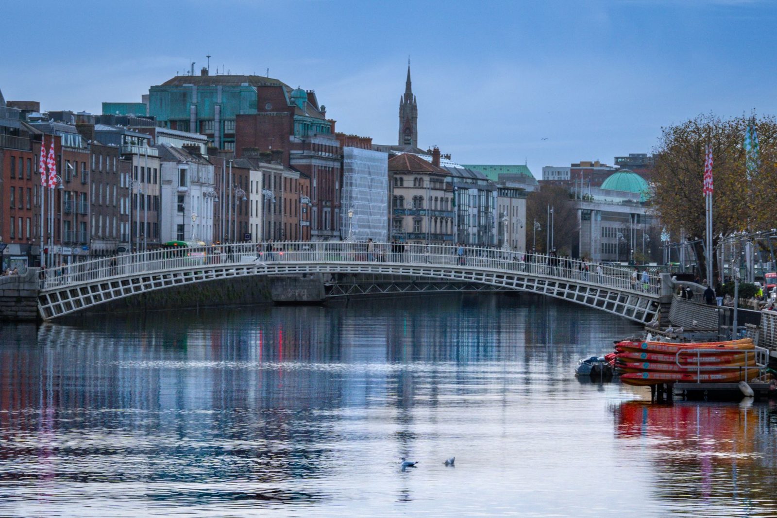 Ha'penny Bridge over the River Liffey at dusk in Dublin in November
