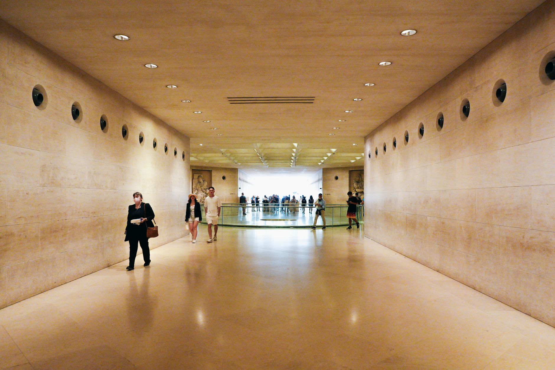 Visitors in a bright museum corridor on a wet afternoon in Dublin in November