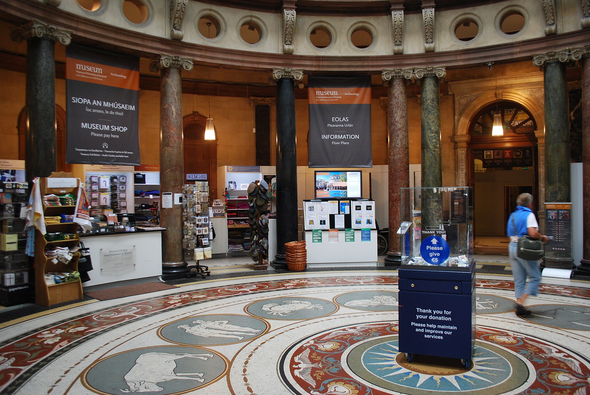 Marble columns and a patterned mosaic floor surround the entrance rotunda of Dublin's National Museum of Ireland.
